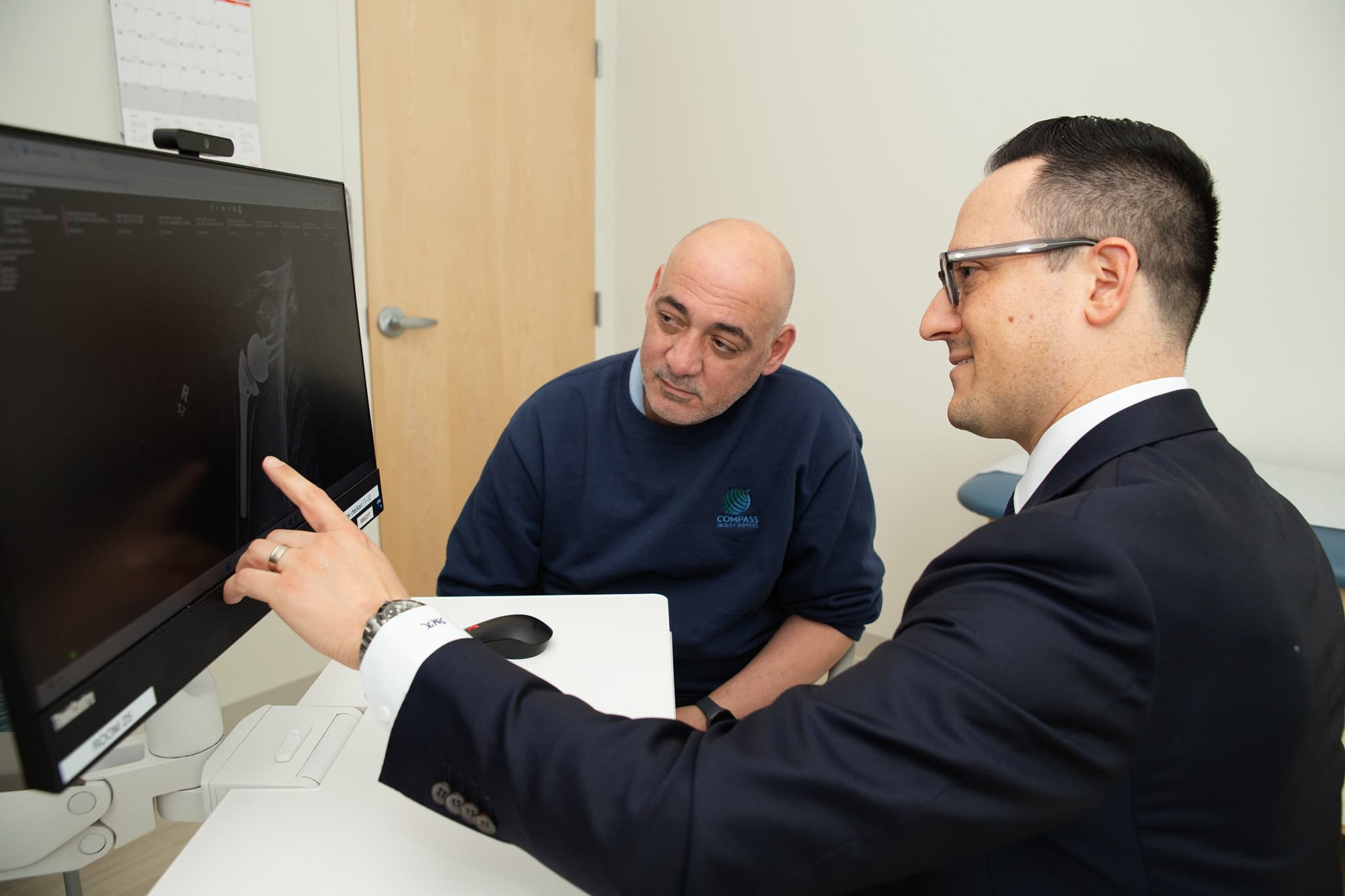 Dr. Kirsch reviewing imaging results with a patient